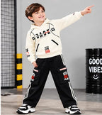 Boys Cream Hoodie and Black Cargo Jogger Co-Ord Set | Full Sleeve Graphic Sweatshirt with Wide Leg Pants and Side Stripes | Casual Outfit for Kids