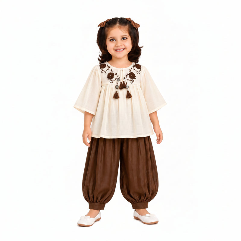CREAM & OFF WHITE TOP ADORNED WITH DARK BROWN FLORAL WORK