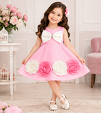 Girls Pink Sleeveless Party Wear Frock with Large White Bow, 3D Pink & White Rose Floral Appliqué and Decorative Hem – Designer Birthday Dress